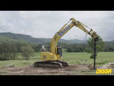 Excavators digging holes